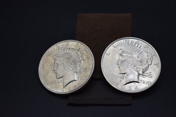 A Pair Of 1924 Uncirculated Peace Dollar Coins
