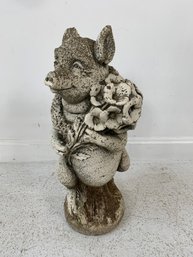 Cement Garden Figure Of A Pig Holding A Bouquet Of Flowers