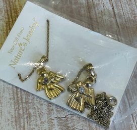 Two Angel Necklaces In Original Box