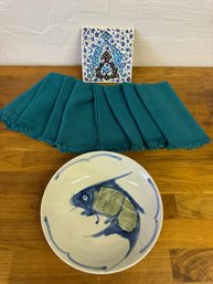 Fish Decorative Ceramic Bowl With Newer Napkins And Colorful Trivet