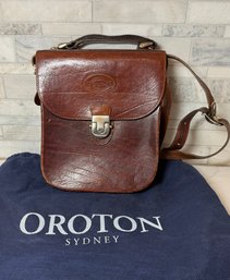 Vtg OROTON Crossbody Textured Leather Bag With Handle And Adjustable Strap.