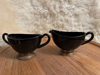 Vintage Black Glass Cream & Sugar Set With Metal Footed Base Possibly Copper Plated
