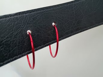 Vibrant Red Hoop Earrings Are Designed For Pierced Ears