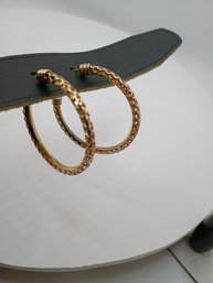 Hoop Earrings Featuring A Diamond-cut Textured Design