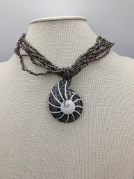 Nautilus-shaped Pendant Necklace Crafted From Paua Abalone Shell