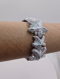 Bracelet Featuring A Starfish Or Floral Link Design