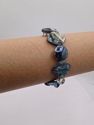 Bracelet Featuring Iridescent Paua Abalone Shell Nuggets And Crystals