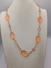 Gold Tone Necklace Featuring Peach And Orange Acrylic Stones