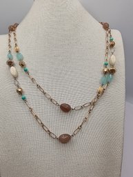 Lia Sophia Layered Necklace Features Gold-tone Chains With Multicolored Beads