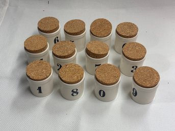 Set Of 12 Cork And Porcelain Containers