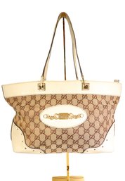 Gucci GG Canvas Punch Tote Bag With Leather Trim