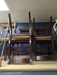 Set Of 4 Brown Wooden Cushioned Chairs