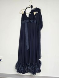 Elegant Midnight Navy Blue Formal Evening Gown Featuring A Halter Neckline, Size 4, By Marchesa