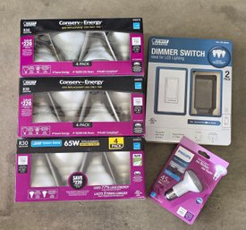 Assortment Of Unused Light Bulbs And Dimmer Switch