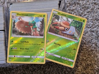 PK3 Wonderful Assortment Of Pokemon Trading Cards With Fancy Plastic Display Case