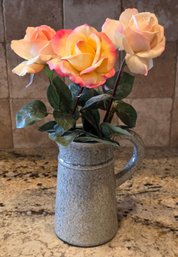 Assortment Of Artificial Silk Roses Arranged In A Ceramic Pitcher
