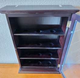 Dark-finished Wood Cabinet Is Designed To Hold And Display A Collection Of 12 Golf Balls