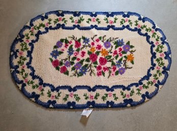 Vintage, Handmade Hooked Rug Featuring A Vibrant Floral Pattern