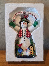 Ruth Ninneman Music Box Featuring A Snowman Holding A Sign