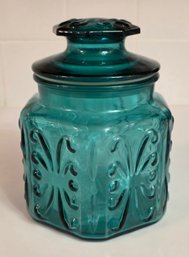 Vintage Teal Green Glass Canister Jar Featuring An Atterbury Scroll Pattern And A Matching Lid