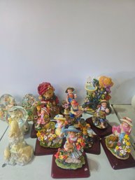 This Large Lot Of Snow Globes And Resin Figurines