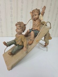 Lively Figurines Of Children Playing