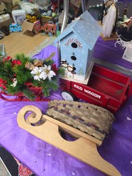 Two Sleds, Red Wagon And A Bird House