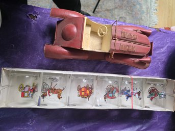 A Set Of Luminarc Glasses And A Metal Car