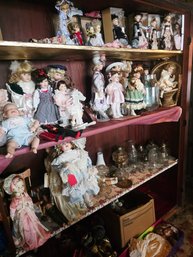 All The Dolls And Other Items On This 3 Shelves