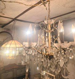 Crystal Chandelier And A Ceiling Lamp Fixture