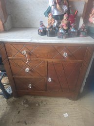 Antique Wooden Dresser Or Chest Of Drawers With A Marble Top And Glass Knobs