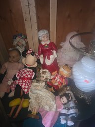 All The Dolls On This Shelf Plus The Lamp