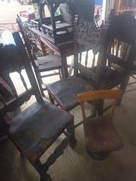 4 Antique Carved Wood And Leather Chairs, Plus A Small Child Chair