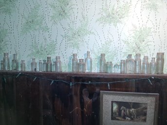 All The Antique Bottles On Wall Multiple Sizes