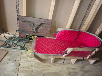 Two Sleds, One Is A Large Tobbogan, Quilted, And A Wall Plaque