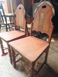 4 Antique  Wood Dining Chairs With A Western Or Native American-themed Folk Art Design.
