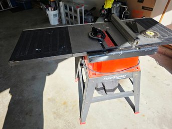 Black & Decker Firestorm 10-inch Table Saw Mounted On A Matching Metal Stand