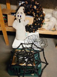 Vintage Melted Plastic 'popcorn' Ghost Light-up Decoration Alongside A Black Tinsel Wreath And Spiderweb Props