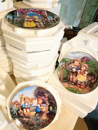Seven  M.I. Hummel 'Little Companions' Collector Plates By The Danbury Mint With Gold Trim