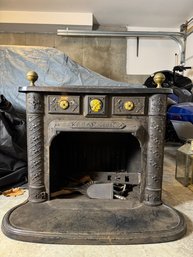 CAST IRON FRANKLIN PARLOR STOVE WITH BRASS FINIALS AND CAMEO TILES (9A)