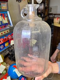 (27A) ANTIQUE GLASS FINGER HANDLE AND POURING SPOUT JUG