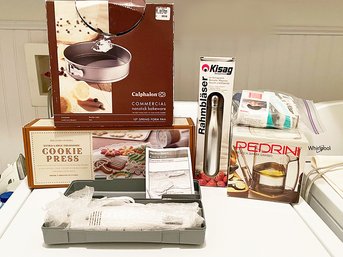Lot Of NEW Kitchen Gadgets: Grease Separator, Electric Knife, Whipped-cream Maker, Springform Pan, And Cookie