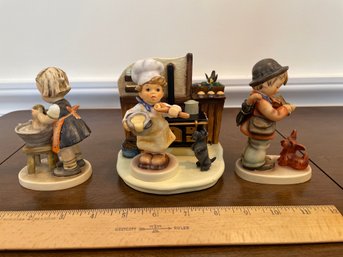 3 Hummels. Doll Bath, In The Kitchen (Kozy Kitchen), Puppy Love (Little Violinist)