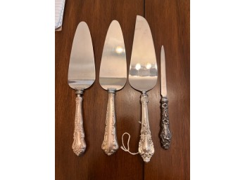 Lot Of Four Sterling Handled Pieces