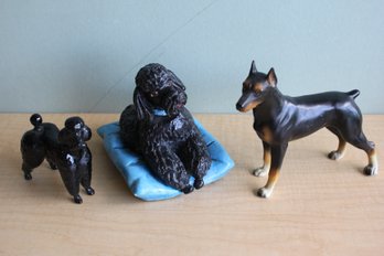 Three Dog Figurines (46)