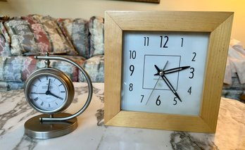 Two Small Clocks (122)