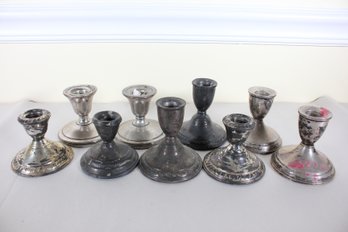 Nine Weighted Sterling Silver Candle Holders (K3)