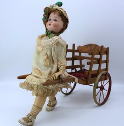 Antique German Bisque Doll With Wooden Wagon- Shippable