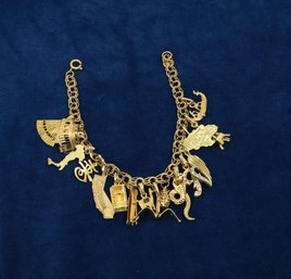 14kt. Yellow Gold Charm Bracelet With 14kt & 18kt Charms- Shippable