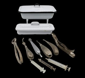 Collection Of Vintage Medical And Dental Instruments Accompanied By Two White Enamel Sterilization Trays